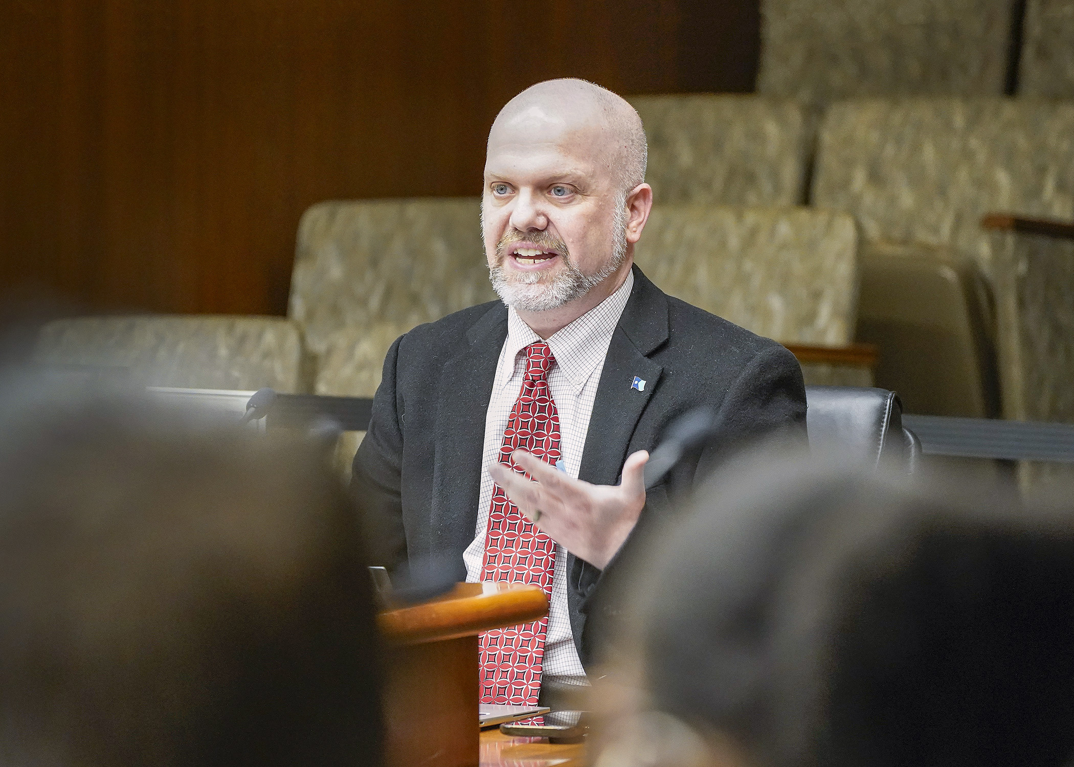Rep. Mike Freiberg presents the elections and campaign finance supplemental budget bill to the House Elections Finance and Policy Committee April 17. (Photo by Andrew VonBank)
